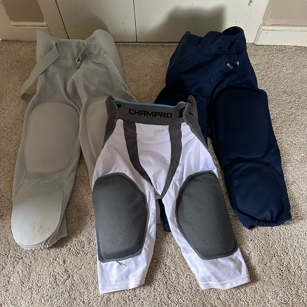 Youth football pants & girdle L and XL Russel & Champro used good condition
